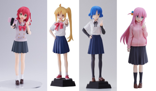 prize figures of the members of kessoku band. kita, the singer, has red hair with a partial side ponytail and is wearing a brown and blue seifuku. nijika, the drummer, has yellow hair in a high ponytail and is wearing a white dress top, a big red polka dot neck bow, and blue knife pleat skirt. ryou, the bassist, has blue hair with uneven bangs, and is wearing a similar outfit to nijika, with the same top and skirt, but with a black long sleeved shirt underneath the dress shirt and a small plain black neck bow. bocchi, the guitarist, wears the same tracksuit jacket and skirt outfit from her nendoroid, mentioned above.