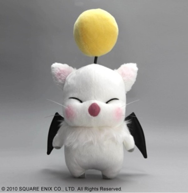 a plush of a moogle. a moogle is a small, white catlike creature that has a small yellow ball above it's head, a small pink nose, and eyes that slant inward that don't open.
