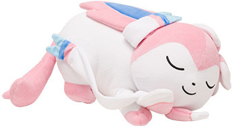 a plush of sylveon, a pokemon. sylveon is a cat-sized and cat-like pokemon, but unlike cats it has long round ears, and little tendril-like feelers? sylveon is mostly white, it's ears are pink with a dark blue interior, along with it's paws, fluffy tail, and part of it's head and neck bow being pink. it's feelers are mostly white, with light blue, dark blue, and pink coloring at the ends. it is curled up and asleep, smiling softly.